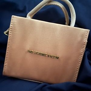 Brandon Blackwood - ESR Cream Satin Bag